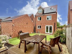 House From Garden- click for photo gallery